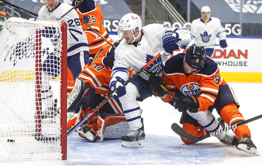 APTOPIX Maple Leafs Oilers Hockey